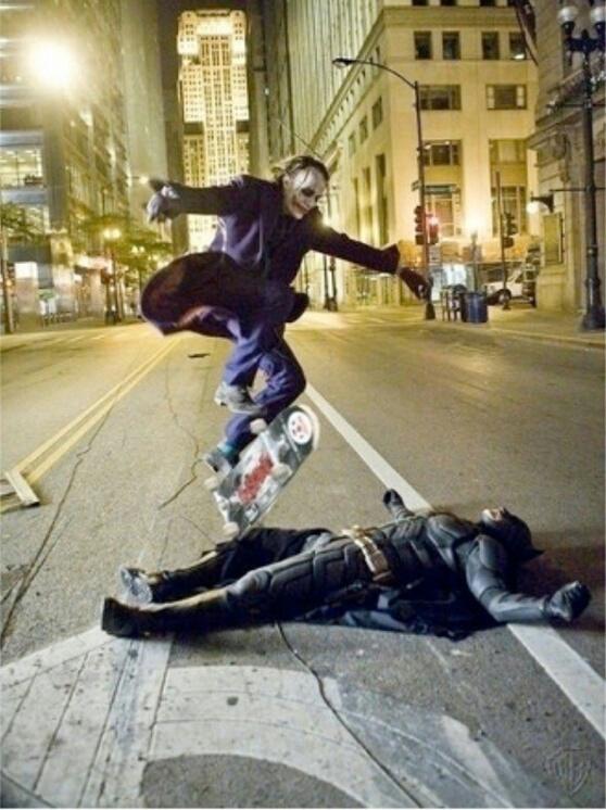 joker kick flipping skateboard
